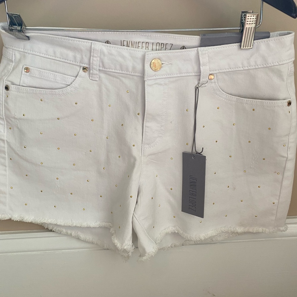 Ladies shorts by JLO white with gold beads.  Size 10 brand new with tags.